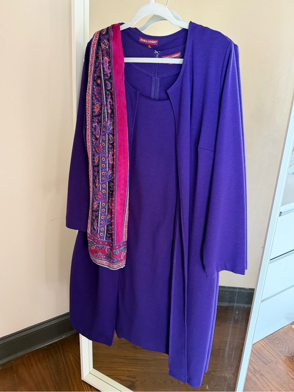 Dress with sweater and cardigan and scarf